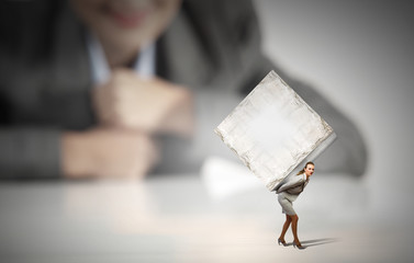 Woman carrying cube