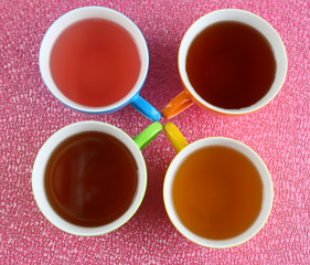 Assortment of tea on color background