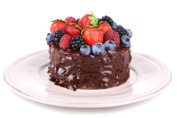 Tasty chocolate cake with different berries, isolated on white