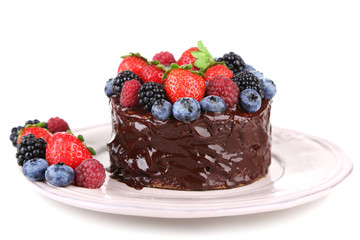 Tasty chocolate cake with different berries, isolated on white