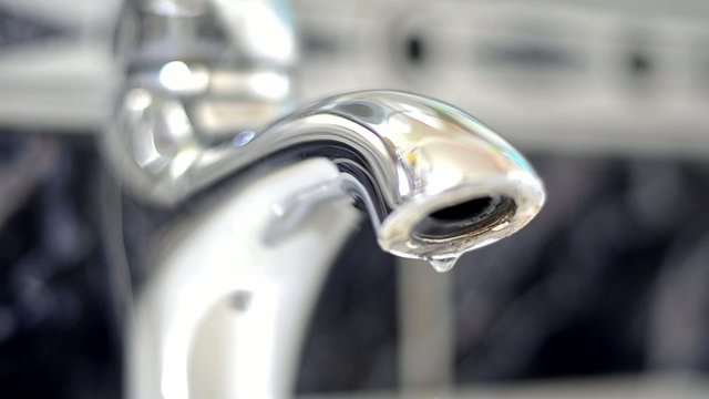 Silver faucet water drips dripping LOOP