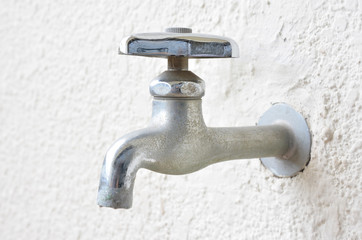 profile of a bronze metallic faucet