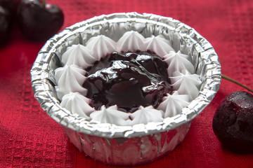 Close-up Blueberry Cake on red tablecloth