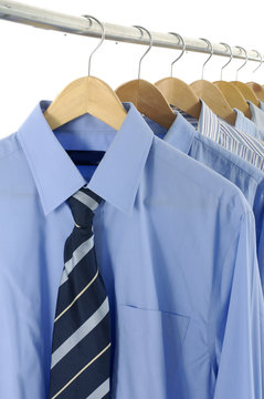 Blue Dress Shirt And Tie On Hangers