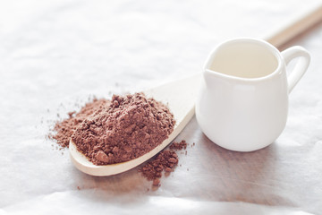 Powdered cocoa ingredient and fresh milk