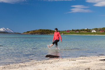 young  sporty woman on sea beach