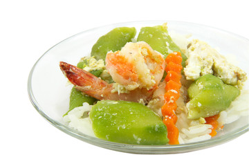 Rice with zucchini and  shrimp fried with path on white backgrou