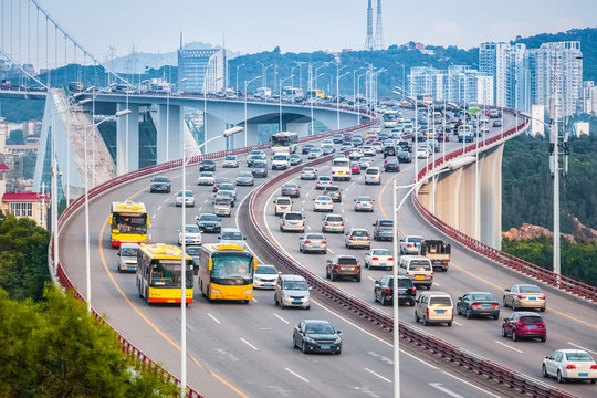 Busy Traffic Closeup On The Bridge