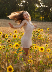 Happy young girl in field