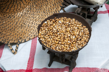 corn in a tilted position for weighing © arnau2098