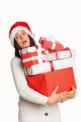 Shocked woman with christmas presents