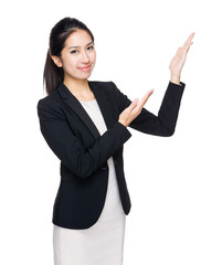 Businesswoman present with hand