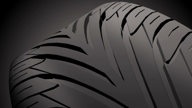Close up on a car tire in motion