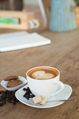 Cappuccino or latte coffee with heart shape