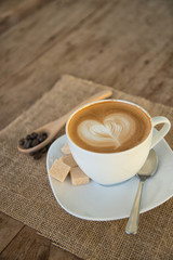 Cappuccino or latte coffee with heart shape