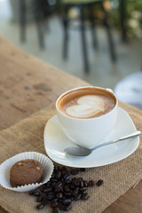 Cappuccino or latte coffee with heart shape