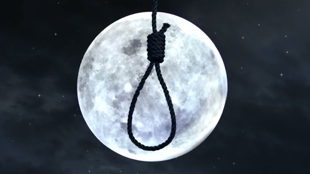 Hanging a noose with the moon in the background.