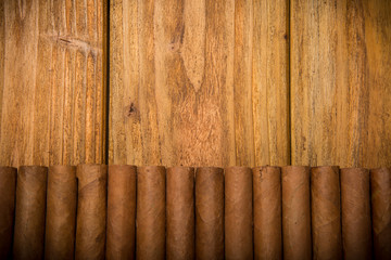 cigars on rustic table