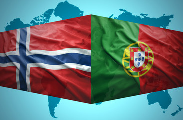 Waving Norwegian and Portuguese flags