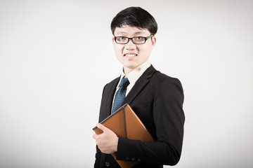 Successful young business man of Asian, full length portrait iso
