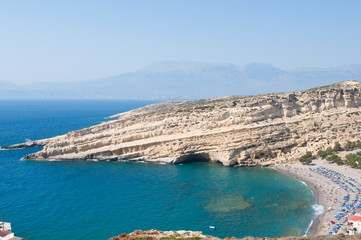 View of Matala caves and Matala beach on Crete, Greece.