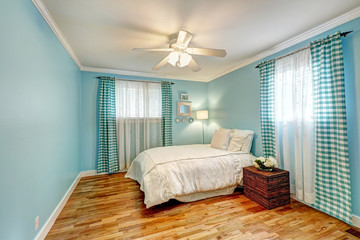 Cheerful light blue bedroom