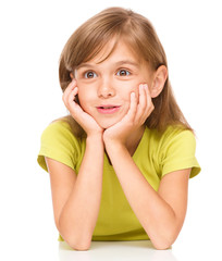 Fototapeta premium Portrait of a cute little girl