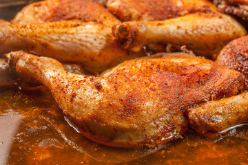 Fried chicken legs in deep fat. Selective focus.