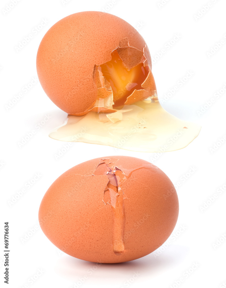 Wall mural broken egg isolated on white background