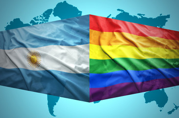 Waving Argentinean and Gay flags