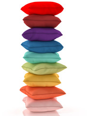 Group of multicolor pillows on white background