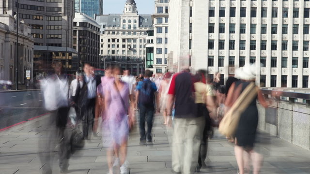 Time Lapse Shot Of Tourists And Commuters Crossing Bridge