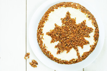 carrot cake with raisins, walnuts and butter cream