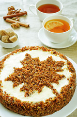 carrot cake with raisins, walnuts and butter cream