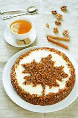 carrot cake with raisins, walnuts and butter cream