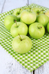 Ripe apples on napkin close-up