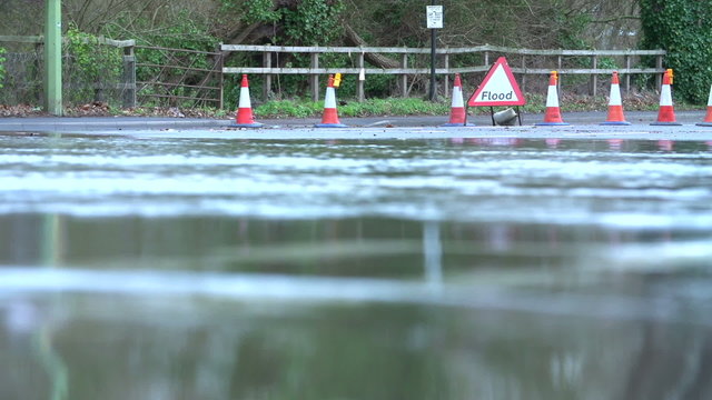 Flood Warning Sign On Road