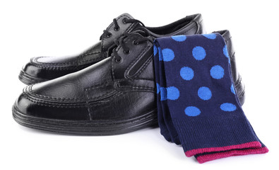 Black man's shoes and socks isolated on white