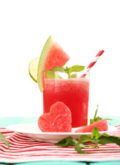 Watermelon cocktail on table, isolated on white