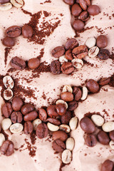 Coffee beans on piece of paper closeup