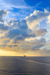 Offshore jack up drilling rig in the middle of the ocean during