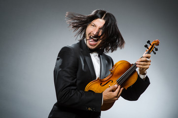 Man violin player in musican concept