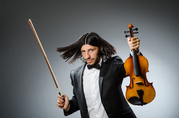 Man violin player in musican concept © Elnur