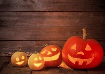 pumpkins on wooden background with copy space