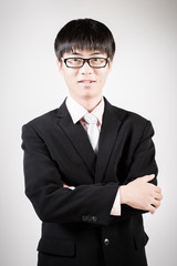 Successful young business man of Asian, full length portrait iso