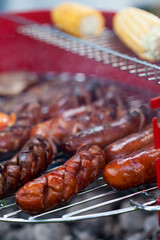 Sausages on a grill
