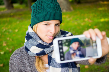 Beautiful girl taken pictures of her self in fall