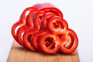 Sliced red pepper isolated on white background