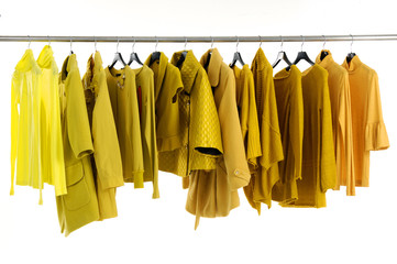 Yellow female jacket on hangers at the show