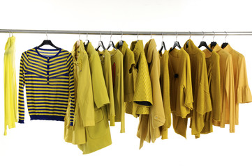 Yellow female jacket on hangers at the show